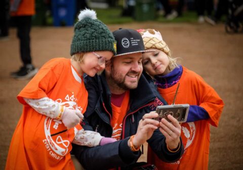 Father and kids at Orange Shirt Day 2023
